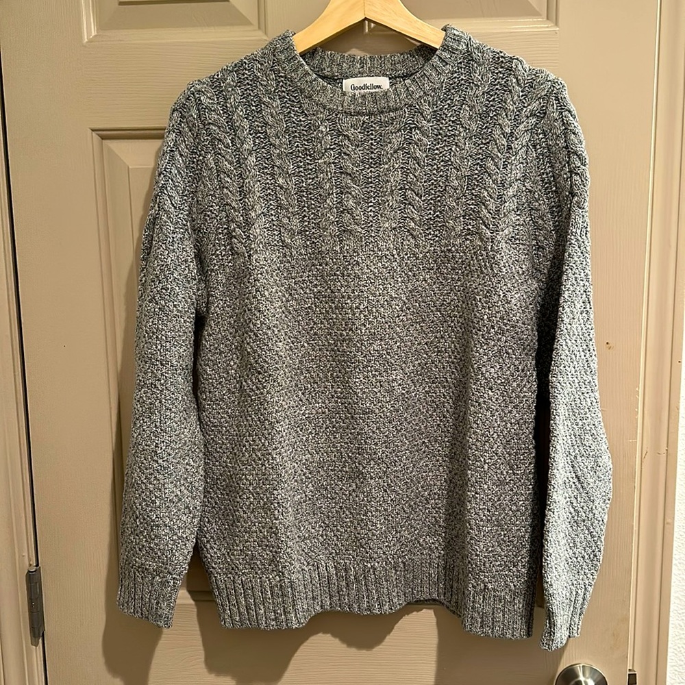 Gray cable-knit sweater